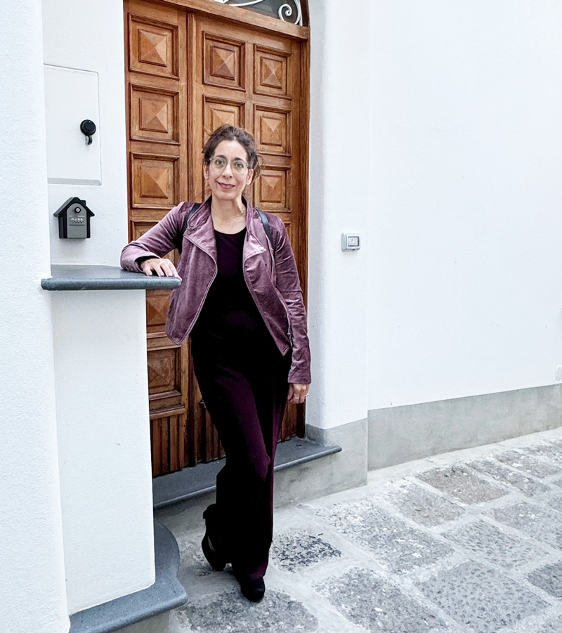 Natalie Anderson in doorway on street in Amalfi, Italy